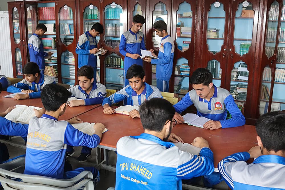 Students reading in the library